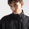 Bavlněná fleecová mikina s polovičním zipem a detaily z materiálu Re-Nylon Bavlněná fleecová mikina s polovičním zipem a detaily z materiálu Re-Nylon