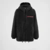 Bunda s kapucí z recyklovaného fleece