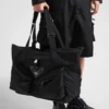Cestovní taška z materiálu Re-Nylon a kůže Cestovní taška z materiálu Re-Nylon a kůže