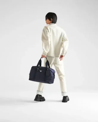 Cestovní taška z materiálu Re-Nylon a kůže Saffiano