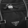 Cestovní taška z materiálu Re-Nylon a kůže Saffiano Cestovní taška z materiálu Re-Nylon a kůže Saffiano