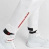 Joggingové kalhoty z technického materiálu s tepelně lepenými švy Joggingové kalhoty z technického materiálu s tepelně lepenými švy