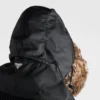 Kapuce z materiálu Re-Nylon a ovčí kůže Kapuce z materiálu Re-Nylon a ovčí kůže