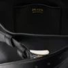 Kožená kabelka Prada Buckle s páskem Kožená kabelka Prada Buckle s páskem
