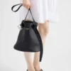 Kožená kabelka Prada Buckle s páskem Kožená kabelka Prada Buckle s páskem