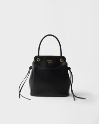Kožená kabelka Prada Carry Mini