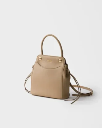 Kožená kabelka Prada Carry Mini