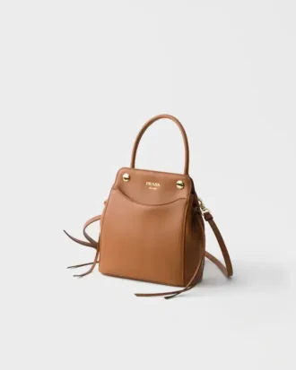 Kožená kabelka Prada Carry Mini