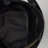 Kožená taška Prada Buckle s ozdobným páskem Kožená taška Prada Buckle s ozdobným páskem