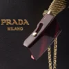 Kožená taška Prada Buckle s ozdobným páskem Kožená taška Prada Buckle s ozdobným páskem