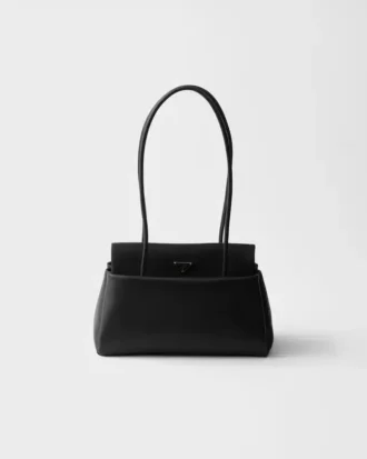 Kožená taška Prada Passage Medium s klopou z materiálu Re-Nylon