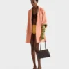 Kožená taška Prada Passage Medium s klopou z materiálu Re-Nylon Kožená taška Prada Passage Medium s klopou z materiálu Re-Nylon