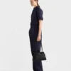 Kožená taška Prada Passage Medium s klopou z materiálu Re-Nylon Kožená taška Prada Passage Medium s klopou z materiálu Re-Nylon