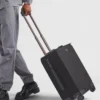 Kufr z materiálu Re-Nylon a kůže Saffiano Kufr z materiálu Re-Nylon a kůže Saffiano