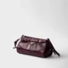 Malá kožená taška přes rameno Prada Bonnie