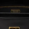 Malá kožená taška přes rameno Prada Soft Sound s přívěsky Malá kožená taška přes rameno Prada Soft Sound s přívěsky