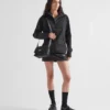 Malá polstrovaná taška přes rameno Prada Traveller z materiálu Re-Nylon Malá polstrovaná taška přes rameno Prada Traveller z materiálu Re-Nylon