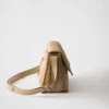 Malá polstrovaná taška přes rameno Prada Traveller z materiálu Re-Nylon Malá polstrovaná taška přes rameno Prada Traveller z materiálu Re-Nylon