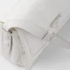 Malá polstrovaná taška přes rameno Prada Traveller z materiálu Re-Nylon Malá polstrovaná taška přes rameno Prada Traveller z materiálu Re-Nylon