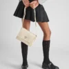 Malá polstrovaná taška přes rameno Prada Traveller z materiálu Re-Nylon Malá polstrovaná taška přes rameno Prada Traveller z materiálu Re-Nylon