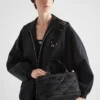 Malá polstrovaná taška z materiálu Re-Nylon Malá polstrovaná taška z materiálu Re-Nylon