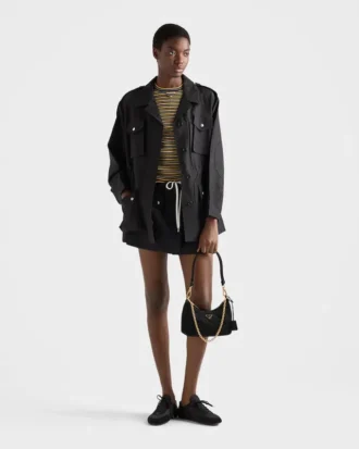 Mini taška Prada Re-Edition z prošívaného materiálu Re-Nylon