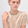 Náhrdelník Couleur Vivante – bílé zlato s akvamarínem a peridotem Náhrdelník Couleur Vivante – bílé zlato s akvamarínem a peridotem
