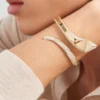 Náramek Eternal Gold Snake ze žlutého zlata a diamantů Náramek Eternal Gold Snake ze žlutého zlata a diamantů