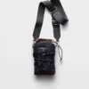 Pouzdro na smartphone Prada Speedrock z materiálu Re-Nylon a kůže Pouzdro na smartphone Prada Speedrock z materiálu Re-Nylon a kůže
