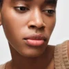 Prada Optimizing Care Lip Balm – U011 – Noisette Prada Optimizing Care Lip Balm – U011 – Noisette