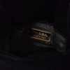 Prada Petit Sac Noir Mini sametová a nappa kožená taška ve tvaru kbelíku Prada Petit Sac Noir Mini sametová a nappa kožená taška ve tvaru kbelíku