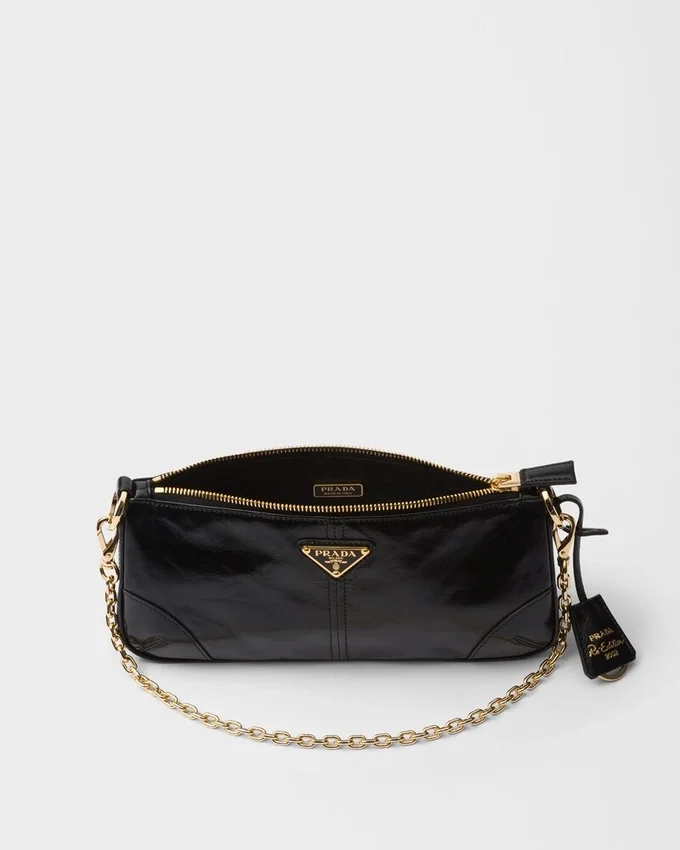 Prada Re-Edition 2002 Středně velká kožená taška přes rameno Prada Re-Edition 2002 Středně velká kožená taška přes rameno