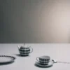 Sada dvou porcelánových čajových šálků – šachovnice Sada dvou porcelánových čajových šálků – šachovnice