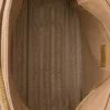 Středně velká kožená taška přes rameno Prada Explore s klopou