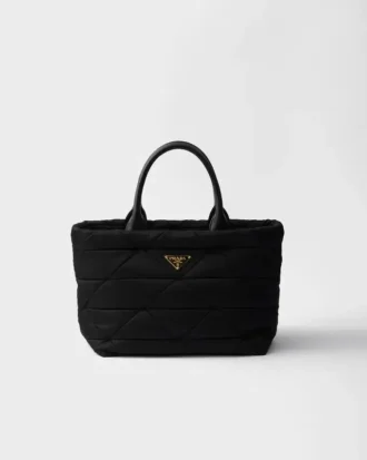 Středně velká polstrovaná taška z materiálu Re-Nylon a kůže