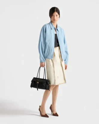 Středně velká taška Prada Explore z materiálu Re-Nylon a kůže