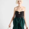 Vlněný a kašmírový bandeau top s broží Vlněný a kašmírový bandeau top s broží