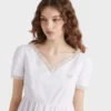 Vyšívané minišaty z látky ve vintage stylu Vyšívané minišaty z látky ve vintage stylu